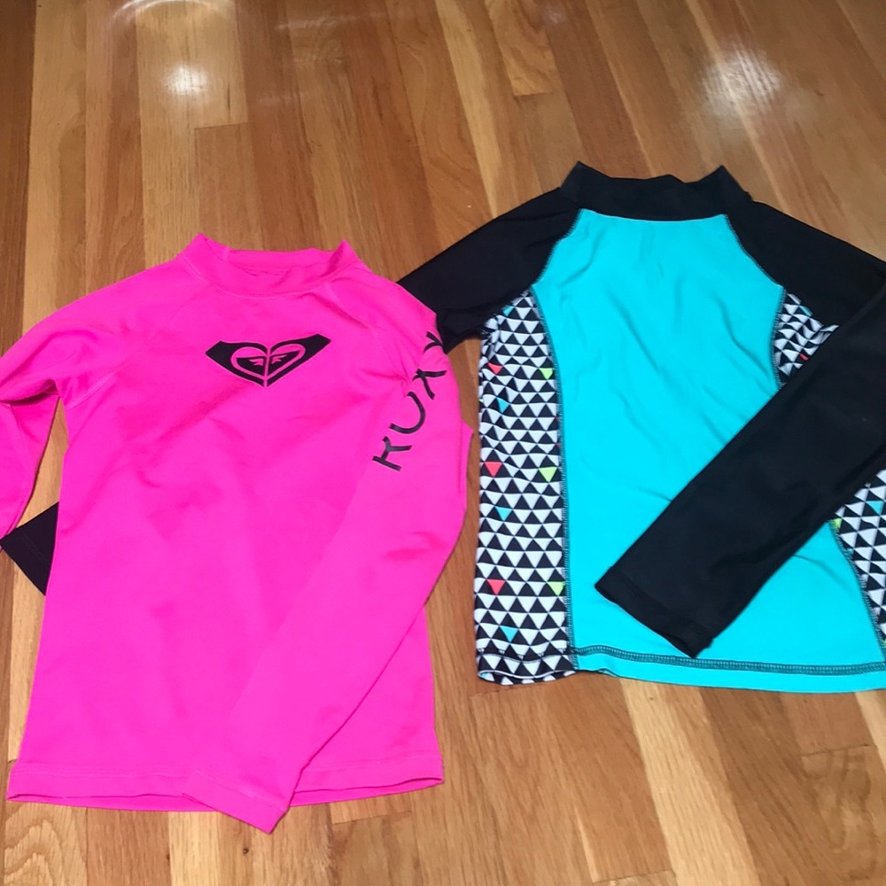 2 Rash guards